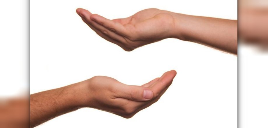 geöffnete Hand für Spenden 